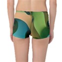 Ribbons Of Blue Aqua Green And Orange Woven Into A Curved Shape Form This Background Reversible Bikini Bottoms View4