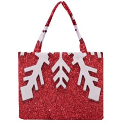 Macro Photo Of Snowflake On Red Glittery Paper Mini Tote Bag by Nexatart