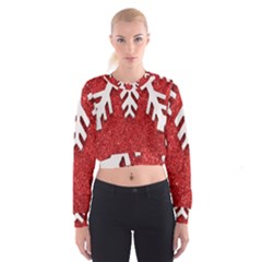 Macro Photo Of Snowflake On Red Glittery Paper Cropped Sweatshirt by Nexatart