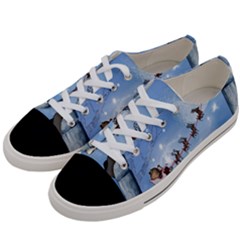 Christmas, Cute Cats Looking In The Sky To Santa Claus Women s Low Top Canvas Sneakers by FantasyWorld7