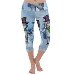 Funny Grimly Snowman In A Winter Landscape Capri Yoga Leggings by FantasyWorld7