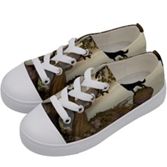 The Lonely Wolf On The Flying Rock Kids  Low Top Canvas Sneakers by FantasyWorld7