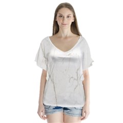 White Marble Tiles Rock Stone Statues V-neck Flutter Sleeve Top by Simbadda