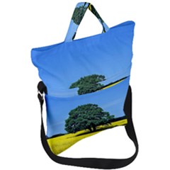 Tree In Field Fold Over Handle Tote Bag by Alisyart