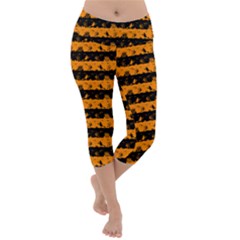 Pale Pumpkin Orange And Black Halloween Nightmare Stripes  Lightweight Velour Capri Yoga Leggings by PodArtist