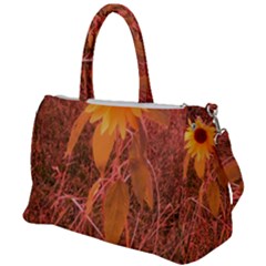 Red Tinted Sunflower Duffel Travel Bag by okhismakingart
