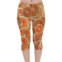 Oranges Background Velvet Capri Leggings  by HermanTelo