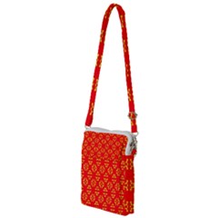 Red Background Yellow Shapes Multi Function Travel Bag by Simbadda