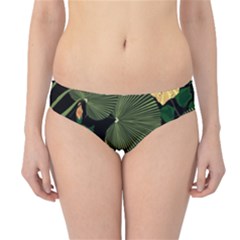 Tropical vintage yellow hibiscus floral green leaves seamless pattern black background. Hipster Bikini Bottoms