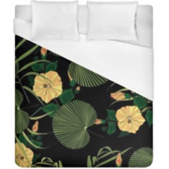 Tropical vintage yellow hibiscus floral green leaves seamless pattern black background. Duvet Cover (California King Size)