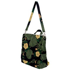Tropical vintage yellow hibiscus floral green leaves seamless pattern black background. Crossbody Backpack