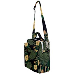 Tropical vintage yellow hibiscus floral green leaves seamless pattern black background. Crossbody Day Bag