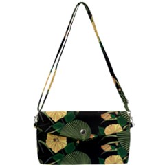 Tropical vintage yellow hibiscus floral green leaves seamless pattern black background. Removable Strap Clutch Bag