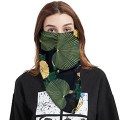 Tropical vintage yellow hibiscus floral green leaves seamless pattern black background. Face Covering Bandana (Triangle)