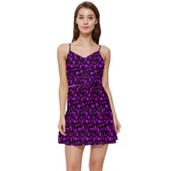 Small Bright Dayglo Purple Halloween Motifs Skulls, Spells & Cats On Spooky Black Short Frill Dress by PodArtist