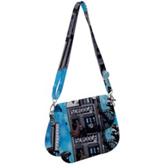 Winter Village Snow Brick Buildings Saddle Handbag by artworkshop