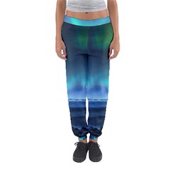 Green Aurora Lights-over Rocky Shore During Night Time Women s Jogger Sweatpants