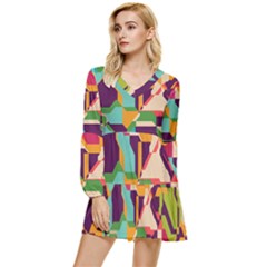 Retro chaos                                                     Tiered Long Sleeve Mini Dress