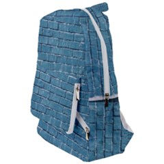 White And Blue Brick Wall Travelers  Backpack by artworkshop