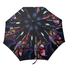 Roadway Surrounded Building During Nighttime Folding Umbrellas by Modalart