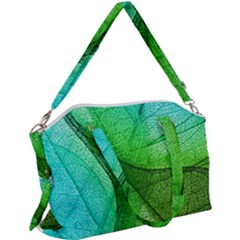 Sunlight Filtering Through Transparent Leaves Green Blue Canvas Crossbody Bag by Ket1n9