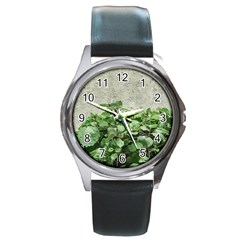 Plants Against Concrete Wall Background Round Metal Watch by dflcprints