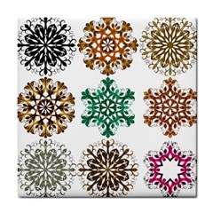 A Set Of 9 Nine Snowflakes On White Tile Coasters