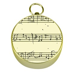 Music Notes On A Color Background Gold Compasses by Nexatart