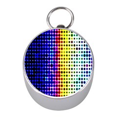 A Creative Colorful Background Mini Silver Compasses by Nexatart