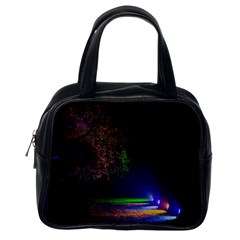 Illuminated Trees At Night Classic Handbags (one Side) by Nexatart