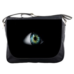 Eye On The Black Background Messenger Bags by Nexatart