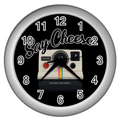 Say Cheese Wall Clocks (silver)  by Valentinaart
