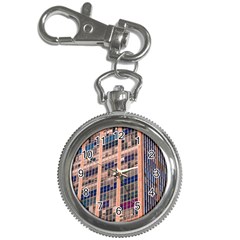 Low Angle Photography Of Beige And Blue Building Key Chain Watches by Pakrebo