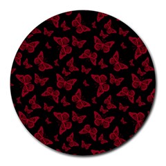 Red And Black Butterflies Round Mousepads by SpinnyChairDesigns
