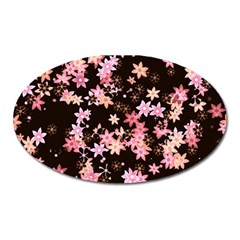 Pink Lilies On Black Oval Magnet by SpinnyChairDesigns