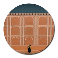 Person Stands By Tall Orange Wall And Looks- Up Round Mousepad by artworkshop