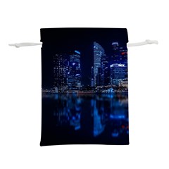 Illuminated Cityscape Against Blue Sky At Night Lightweight Drawstring Pouch (s) by Modalart